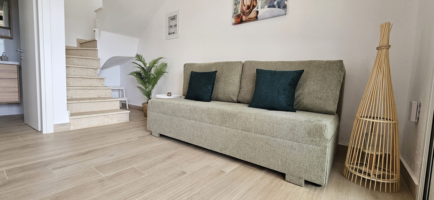 Arillas Peaceful Bungalows Corfu sofa and staircase